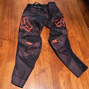 Fox Racing 180 Motocross Pants, size 26 Youth, black and orange